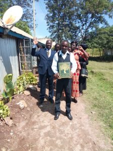 Pastor Oddy waving as the the TLV reaches RIAT congregation